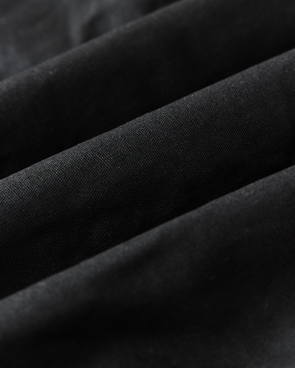 The Insulated Bomber Jacket in Coal Dry Wax